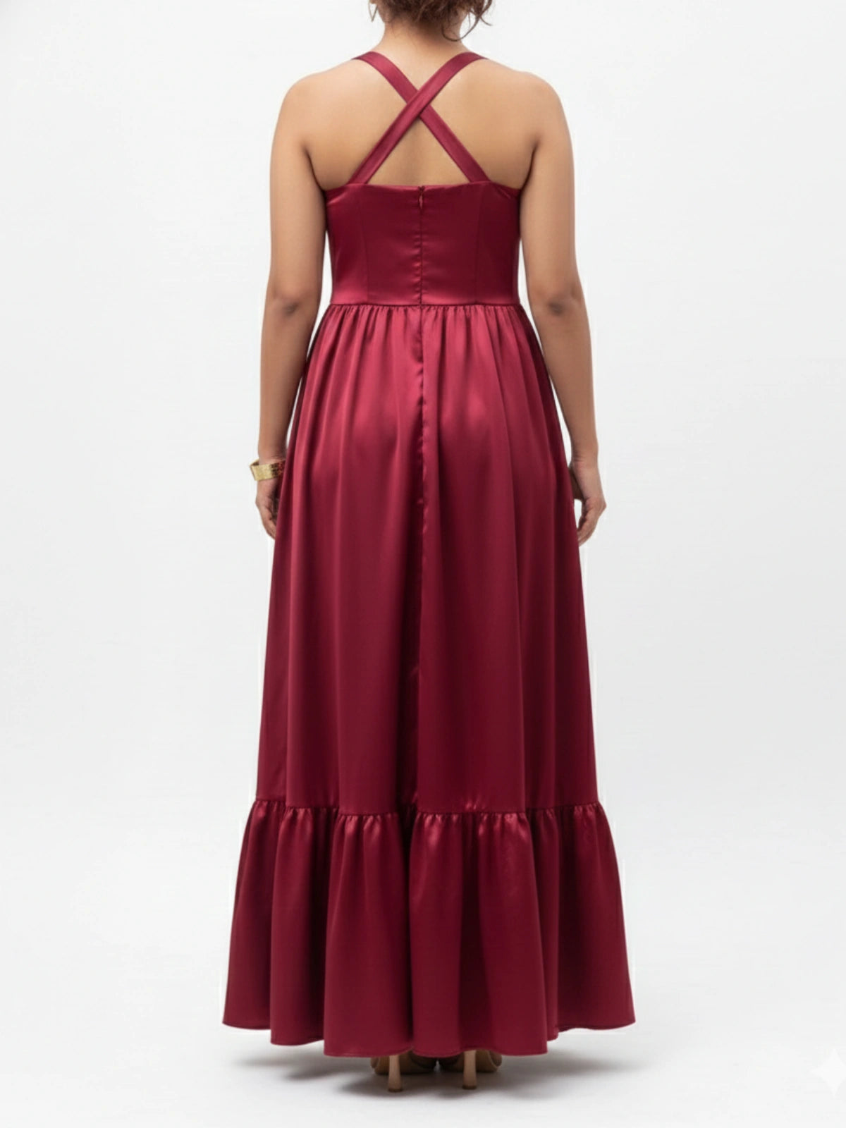 Red evening gown with a cross-back design on a white background