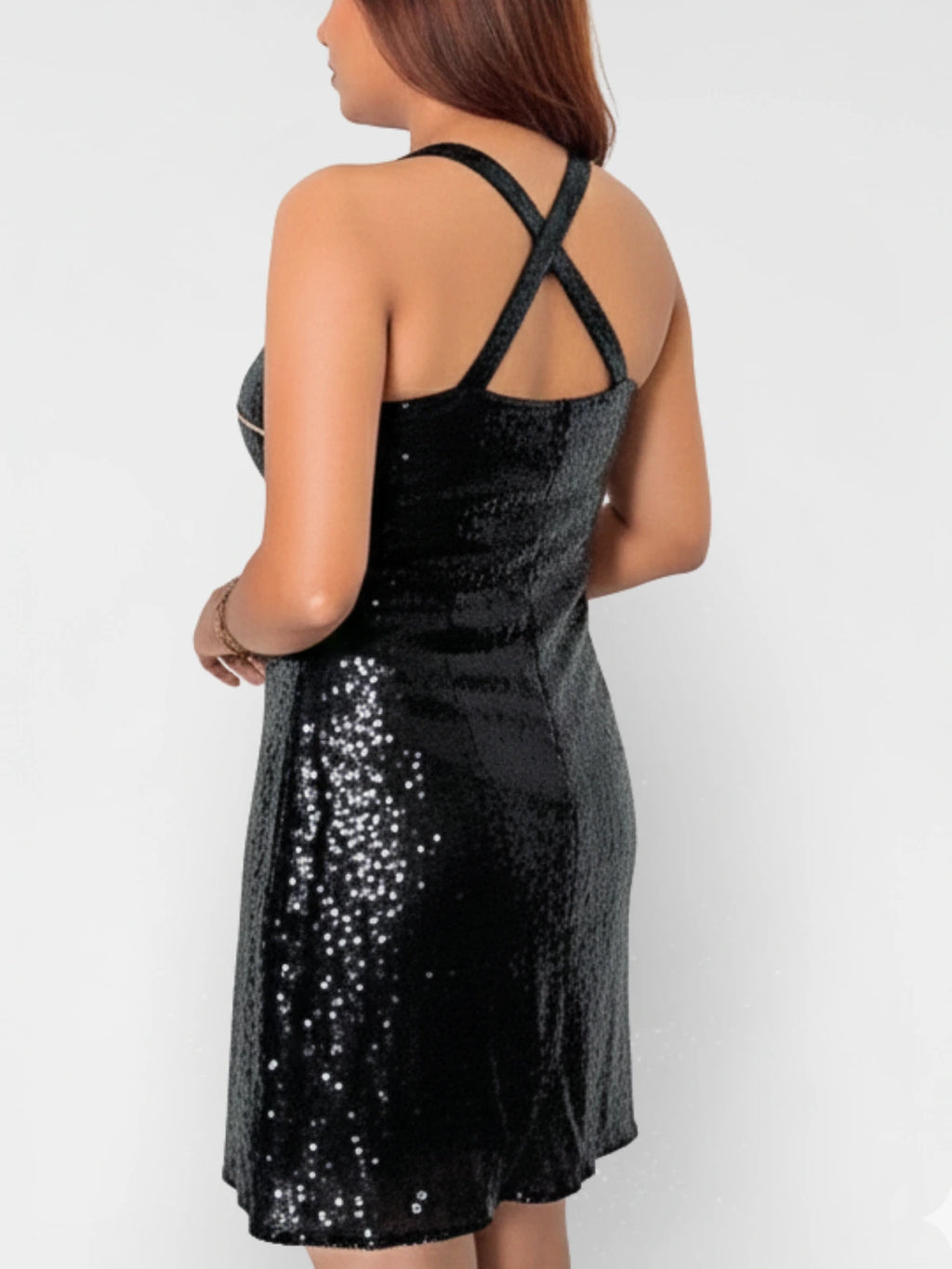 Black sequin dress worn by a person on a white background